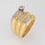 Stylish diamond wide band crafted in 18 karat yellow gold (circa 1970s). The larger old European cut diamond is estimated...