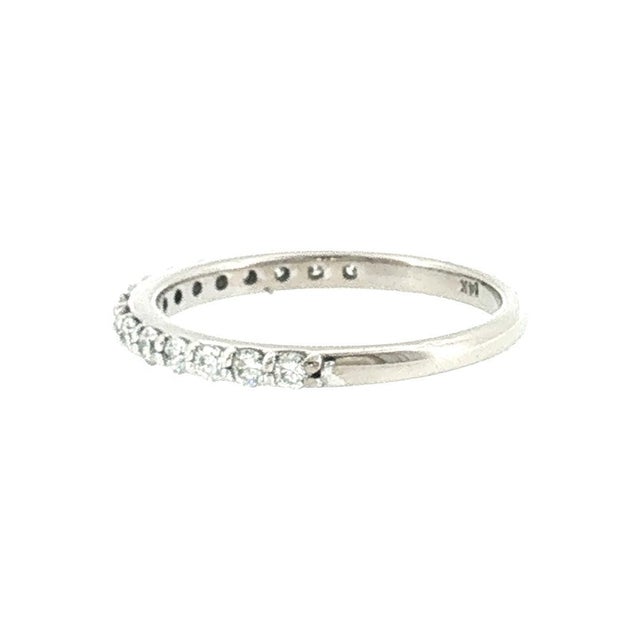 A late 20th-century stackable ring in 14k white gold. Features 16 natural brilliant-cut white diamonds with a total carat...