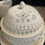 This is a stunning piece of English creamware featuring a large serving bowl with lid and 14” matching underplate. The...