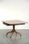This antique English drop-leaf side table dates from the 19th century and features beautiful brass handles. Side tables...