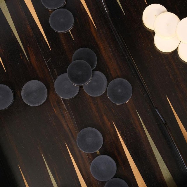 Gaming table / Gametable, France, circa 1850, mahogany, original brass fittings and brass finials, one drawer on each long...