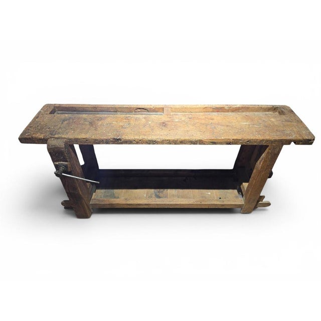 An impressive and authentic 19th-century carpenter’s workbench, constructed from solid wood and retaining the wonderful...
