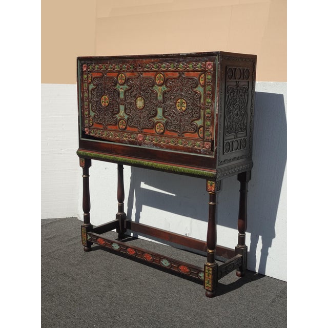 Gorgeous Cabinet in Good Vintage Condition... Except the drop front door requires some restoration. There is a break on...