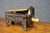 Antique Victorian cast iron tobacco cutter featuring an ornate molded body with decorative scrollwork, floral rosettes,...