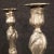 Pair of Italian candle holders from the mid-20th century. Finely chiselled objects in silvered metal, beautifully...