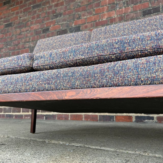 This sofa was designed by Danish furniture designer Hans Olsen. It features a beautifully refinished Rosewood frame and...