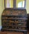 This Maitland Smith secretary is an absolutely stunning statement piece that features an embossed deep rich finish, with...