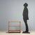 Vintage Italian-made bookshelf from the 1960s, crafted with a walnut veneer wood structure. This piece features a two-tier...