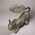 This is a cast bronze sculptural stand or fruit tray in the form of a standing tiger. The tiger is depicted in a dynamic,...