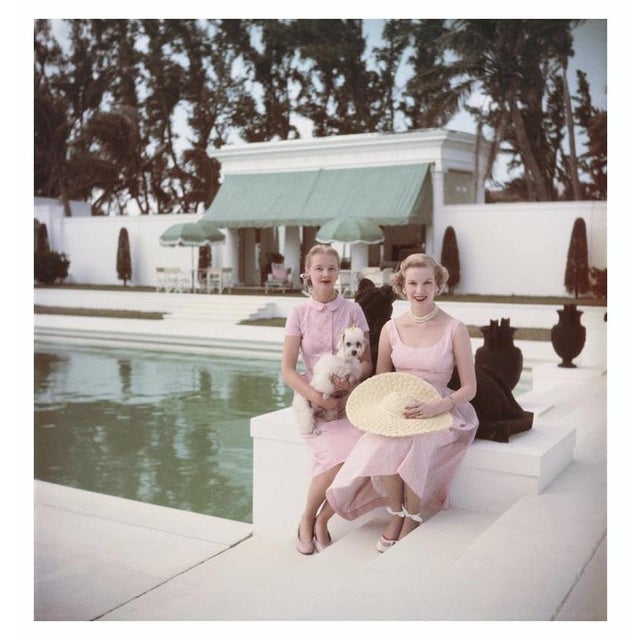 Socialites 1961 Socialite CZ Guest (Mrs F. C. Winston Guest) sitting with Joanne Connolly in Palm Beach, Florida. Slim...