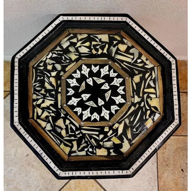 A new arrival. Octagonal shape. This beautiful handmade, modern look, resin inlaid Moroccan side table measures...
