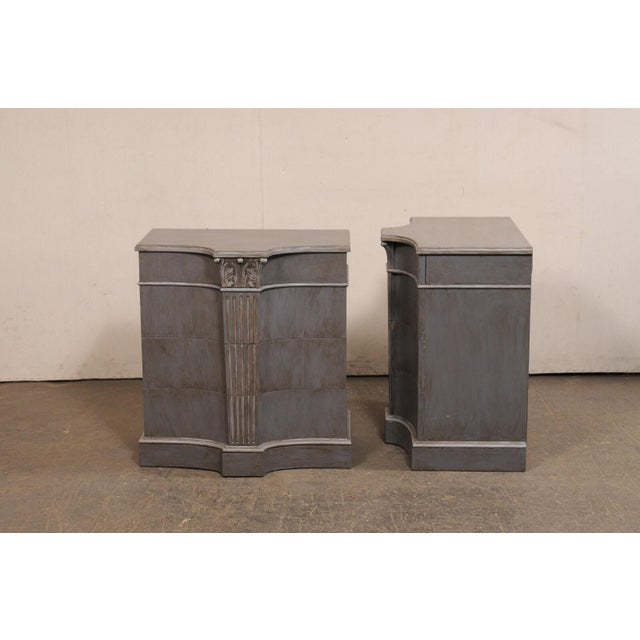 A very cool pair of French carved and painted wood side chests, with central fluted column motif, from the mid 20th...