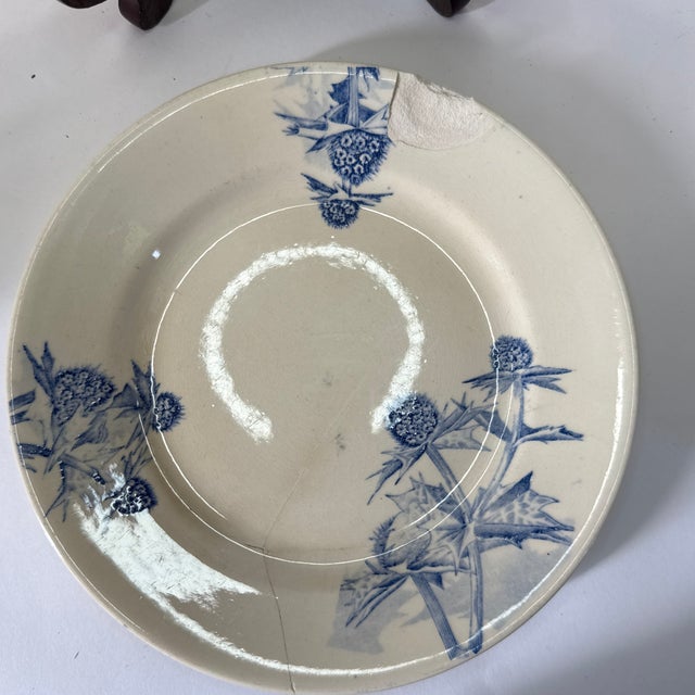 A charming pair of antique Dutch transferware plates by Petrus Regout & Co. of Maastricht, rendered in the classic...