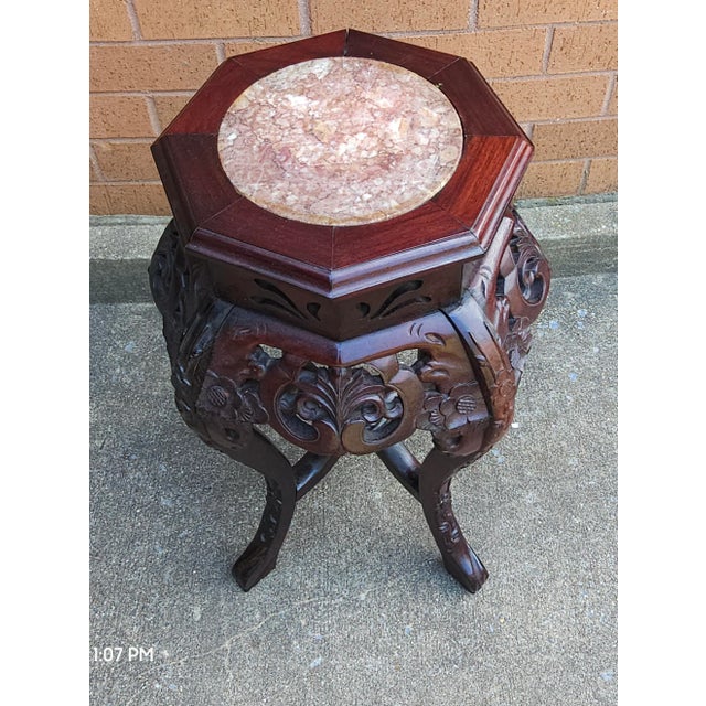 Mid Century Red Hongmu and Marble Top Stand Measures 14" in width, 14" in depth and stands 25" in height. Top is 11" x 11"...