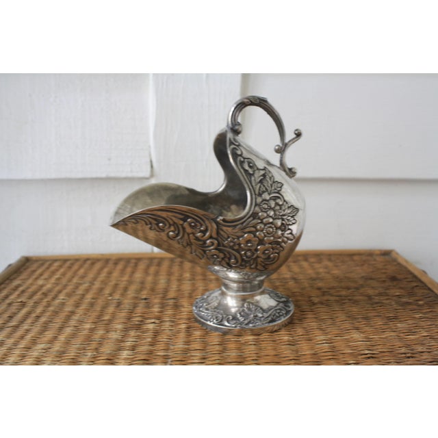 Old silver-plated sugar scuttle! This is a lovely piece that would be perfect for serving up sugar for your morning coffee...