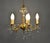 An elegant example of French lighting from the early twentieth century, this antique gilt brass and cut glass chandelier...