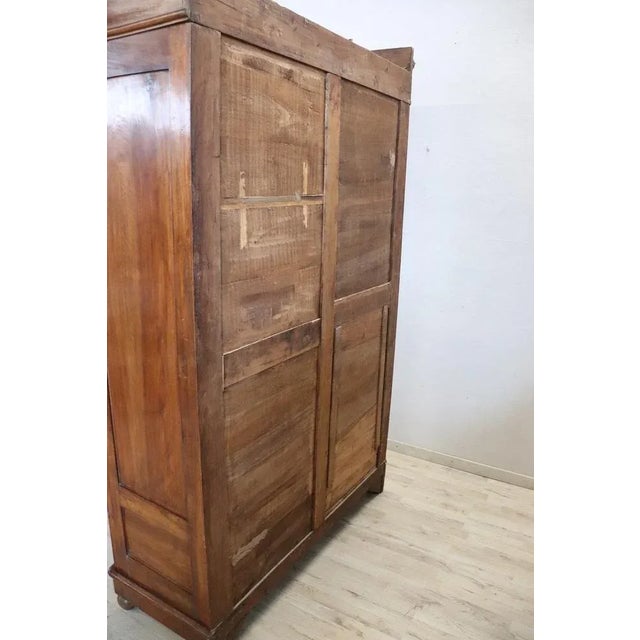 Italian antique in solid walnut wood bookcase or vitrine. Very linear and essential perfect to be combined even in a...