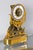 Extremely fine quality Directoire/Empire gilt bronze mounted gilt brass skeleton clock with enameled chapter ring and...