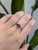 Dare to be different. This east-west set 1.6 carat purple spinel ring is a modern twist on classic luxury. Framed with...