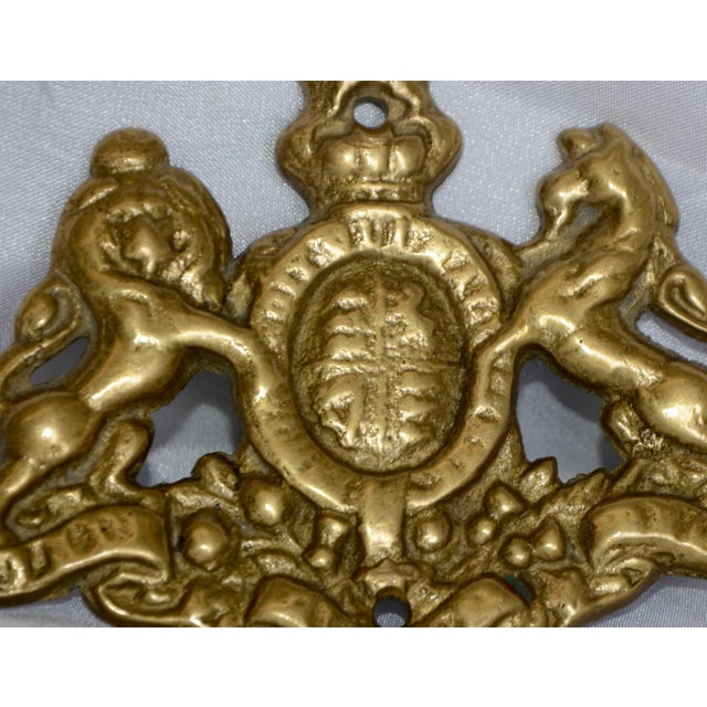 A mystical coat of arms is made of cast brass and mounts on your wall or would be lovely as an embellishment on a piece of...