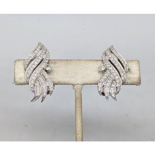 Mid-Century Modern Vintage Signed Polcini Rhodium Plated Clear Rhinestone Clip Earrings-2 Pieces For Sale - Image 3 of 7