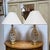 Design Plus Gallery presents a Pair of Ceramic Table Lamps with Leaf Motif Cut Outs. These elegantly rustic and shabby...
