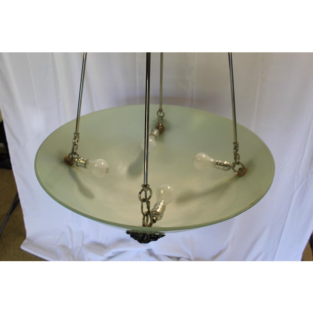 A Custom designed and Custom made Art Glass shade with frosted glass . Has bronze appliques attached to the out side of...