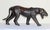 Rare and exceptional example of mid-century British craftsmanship, this vintage handcrafted black leather panther...