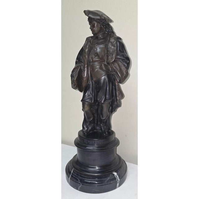 This finely cast bronze sculpture depicts the legendary Dutch master Rembrandt van Rijn, renowned for his unmatched skill...