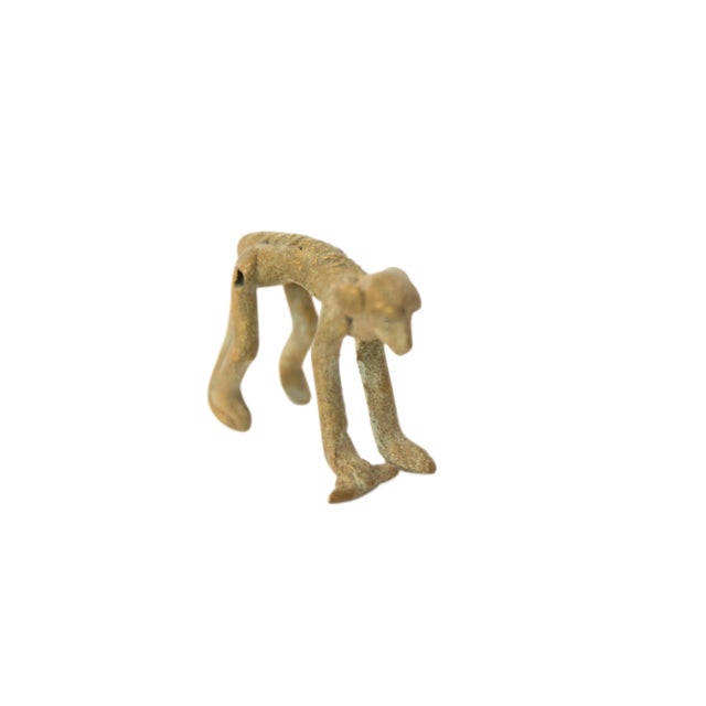 Vintage African Oxidized Bronze Monkey Holding Banana For Sale