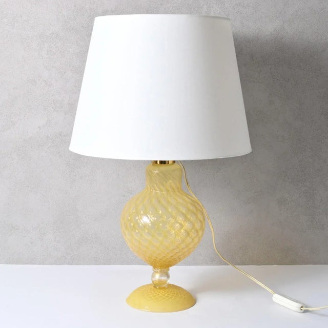 Given dimensions are without the lampshade. Lamp is sold without the lampshade. European Plug (up to 250V).The wiring of...