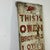 Salvaged Early 20th Century Antique Wood Trade Sign Advertising "Owen Brothers Clothing House", Hand Painted For Sale - Image 4 of 13