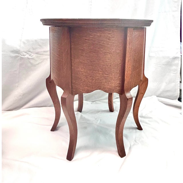 A wonderful, unique antique plant stand. It appears to be handmade. It feels very sturdy and solid. Dimensions 18” tall...