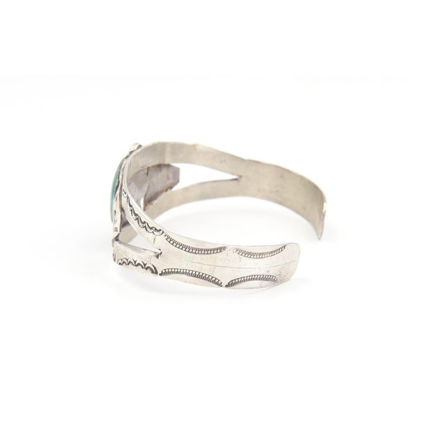 Native American Style Sterling Silver and Turquoise Cuff Bracelet This Southwestern sterling silver cuff bracelet...