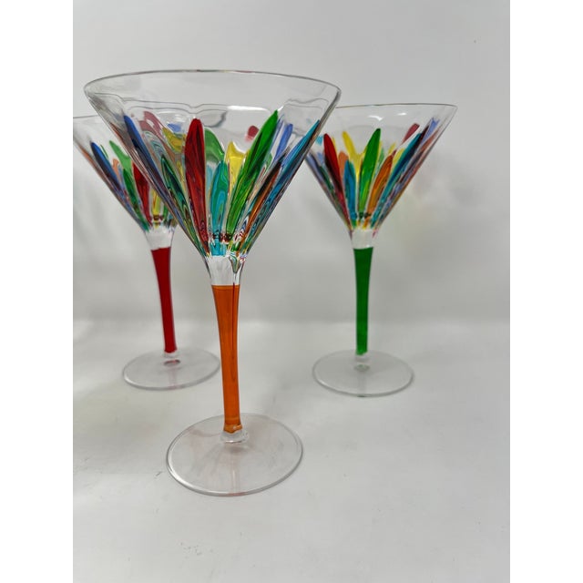 This lovely set of 6 martini glasses features incredible colors and it would be a wonderful addition to any room....