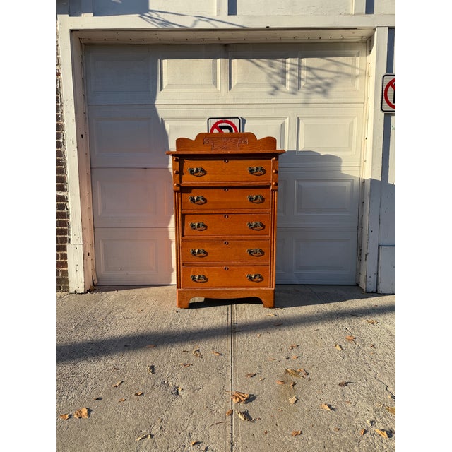 We have an absolutely stunning antique Victorian Eastlake oak highboy dresser for sale. Dating to the late 19th century,...