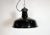 Industrial black enamel pendant light made by Elektrosvit in former Czechoslovakia during the 1950s. White enamel inside...