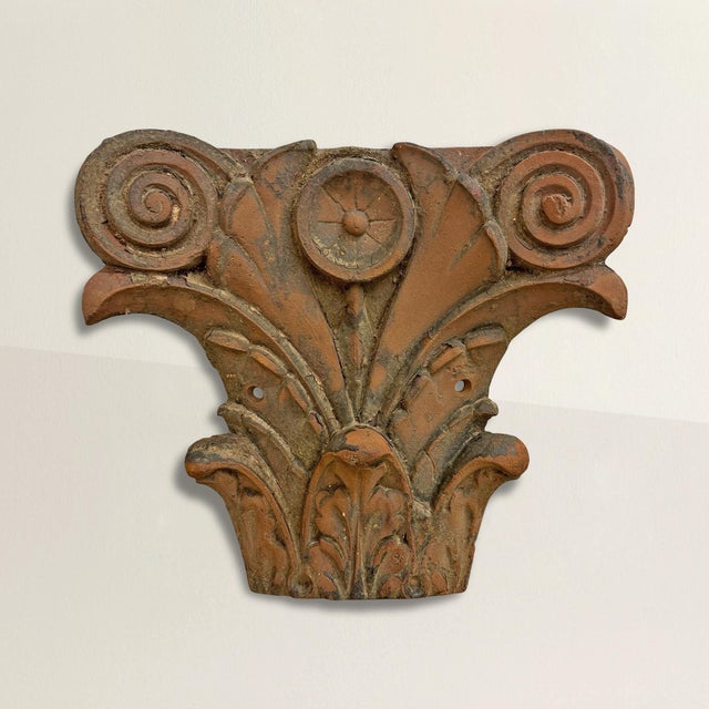 This 19th-century American cast iron pilaster capital is a stunning example of early Art Nouveau design, blending...