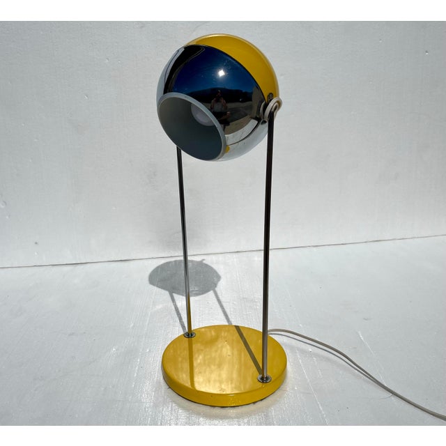 The epitome of mid-century modern, 1970s Robert Sonneman style chrome and yellow lacquer vintage table lamp. This piece...