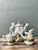 This exquisite 27-piece vintage Capodimonte demitasse service is a stunning tribute to classical Italian artistry and...