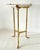 Solid brass tripod table with round marble top. Great next to an occasional chair or as a pull up drinks table. 20' H X...