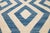 A mid-20th-century Persian Kilim rug, handwoven circa 1956. This elegant flat-weave rug exemplifies the minimalist...