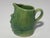 Antique Glazed Stoneware Face Creamer for your consideration. The creamer measures approx. 3 1/4 inches tall and approx. 3...