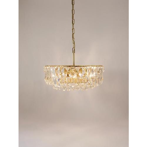 A stunning and large crystal chandelier handcrafted in the 1970s by Bakalowits & Söhne in Vienna, Austria. This exquisite...