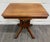 This is a stunning antique Victorian Eastlake walnut parlor table featuring a richly figured walnut top, burl walnut...