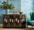A striking vintage Chinoiserie sideboard crafted in black lacquered wood and richly decorated with raised mother-of-pearl...
