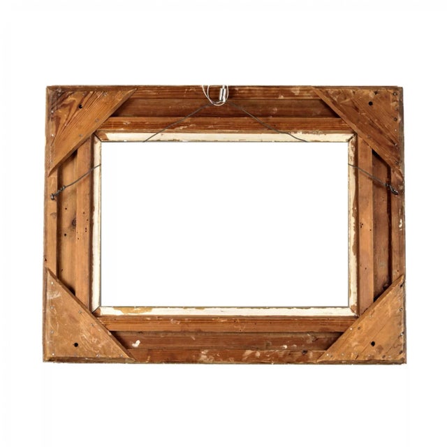 The frame is classic with acanthus and wreath weaving in the decor. Internal dimensions - Height 29cm, Width 43.5cm.