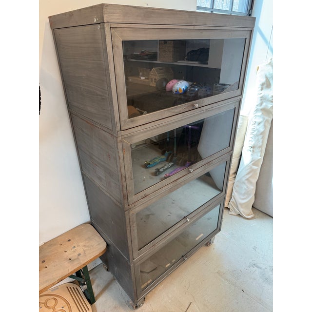Mid-Century Modern Vintage Industrial Steel Barrister Cabinet on Casters With Glass Lift Doors For Sale - Image 3 of 6