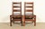 An exceptional pair of antique Mission or Arts & Crafts period solid quarter sawn oak ladder back side chairs or dining...