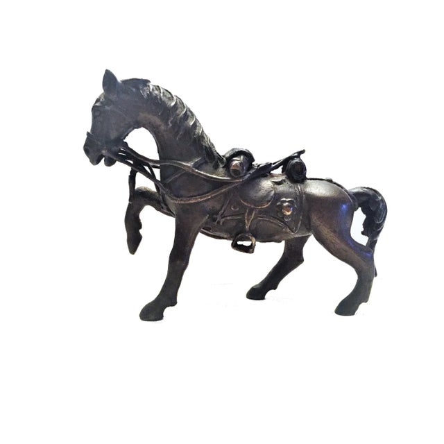This little antique Tibetan equestrian figurine is distinguished not only by the remarkably detailed sculpture of a horse...